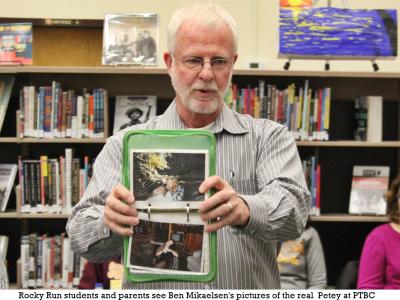 Author Ben Mikaelsen with a book group at PTBC showing pictures of the "real Petey"