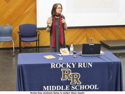 Ms. Amato speaks to Rocky Run's 7th grade students